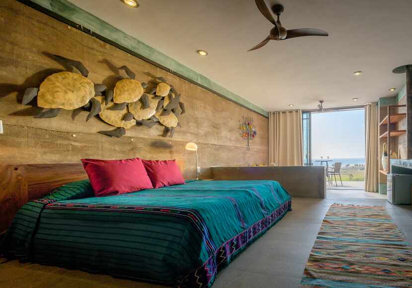Los Colibris Casitas is a verdant hillside property with ocean views and six guest units...