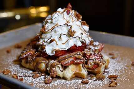 Caleb Lewis' favorite waffle is The House with strawberries, Nutella, cookie butter, whipped...