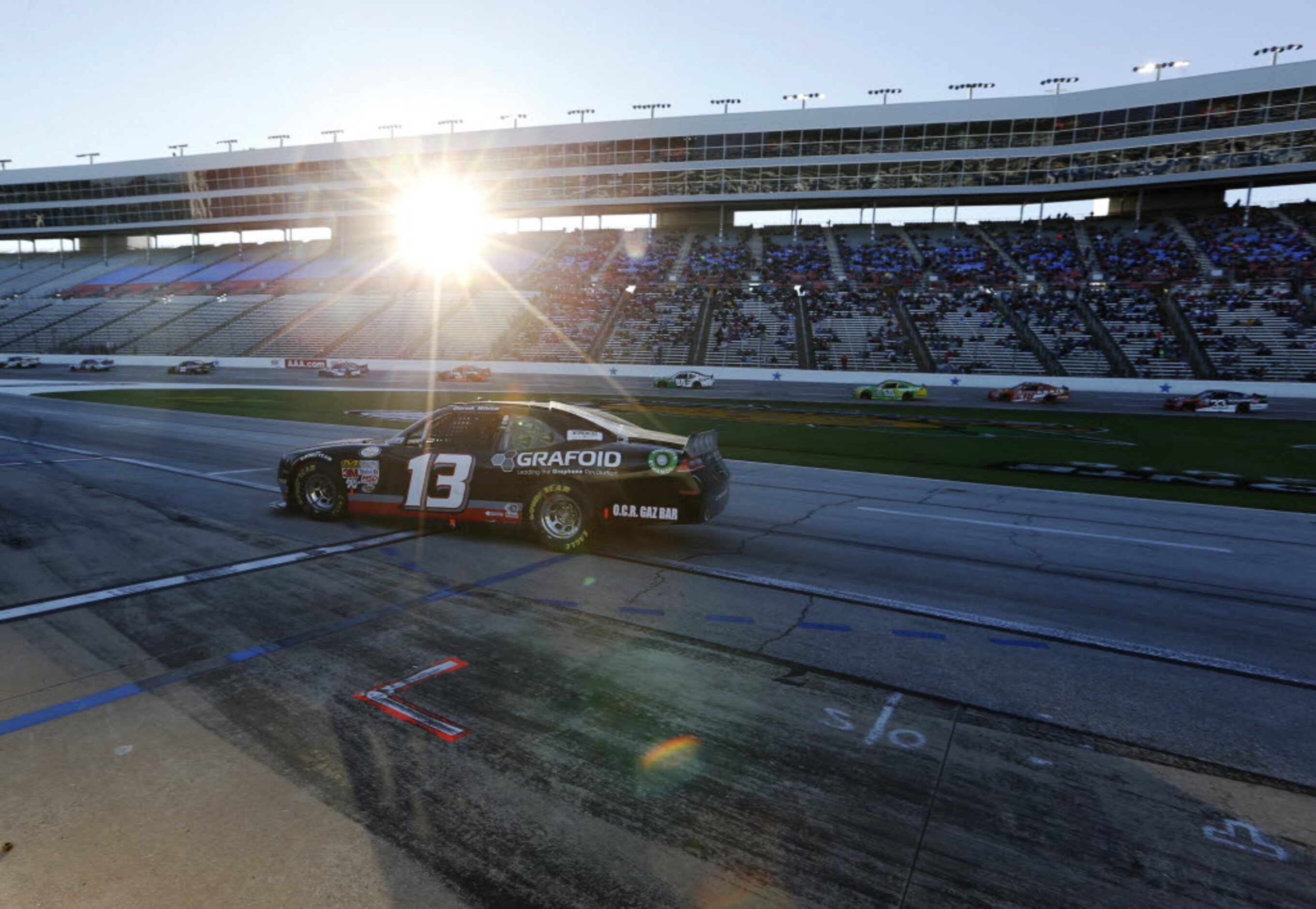 Derek White (13) makes his way in for a pit stop during the NASCAR XFINITY SERIES 11th...