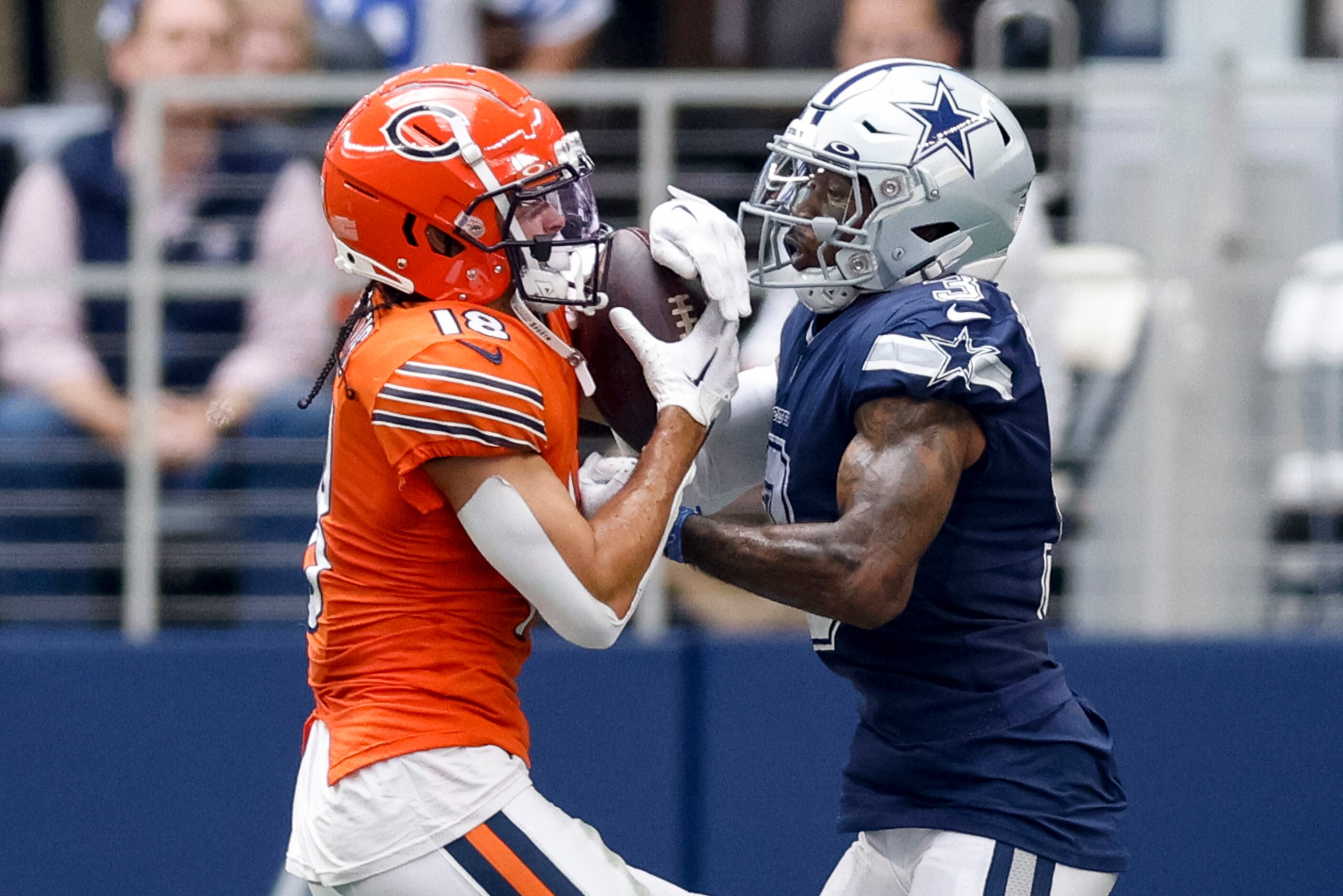 Chicago Bears wide receiver Dante Pettis (18) catches a pass against a defending Dallas...