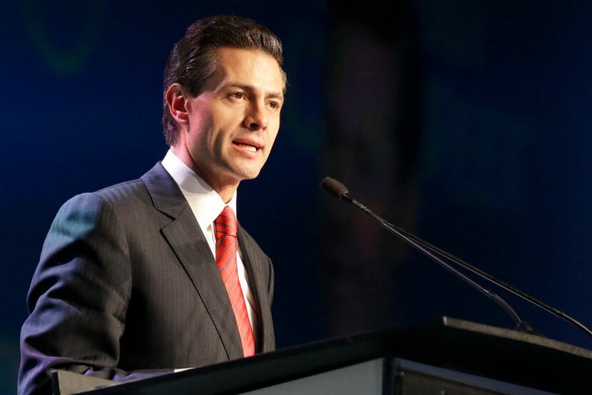  Mexican President Enrique PeÃ±a Nieto gives the opening address to attendees of the annual...