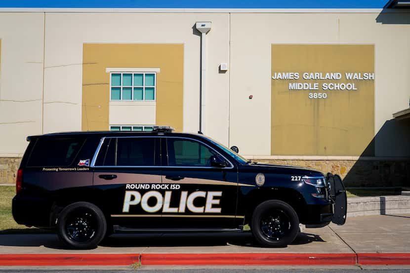 A Round Rock ISD vehicle is seen outside during a school safety active shooter training...