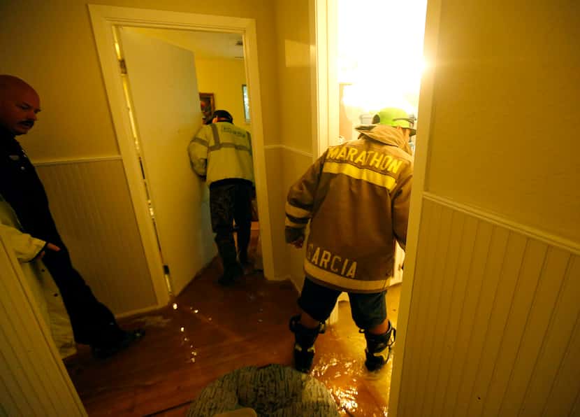 Dickinson police and fire officials search a Dickinson, Texas house they got a welfare check...