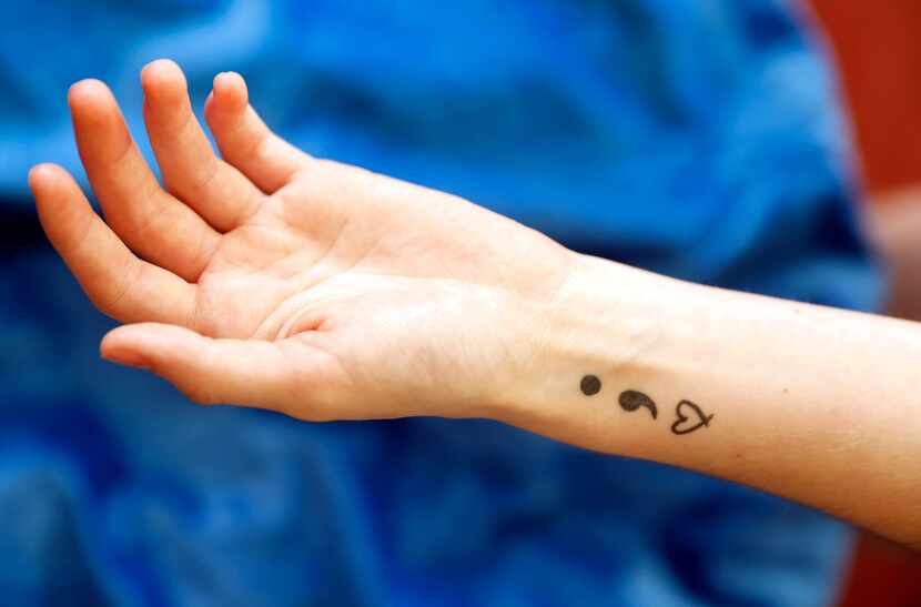 Cry Havoc actor Maggie Brockman's semicolon-and-heart tattoo represents her solidarity with...