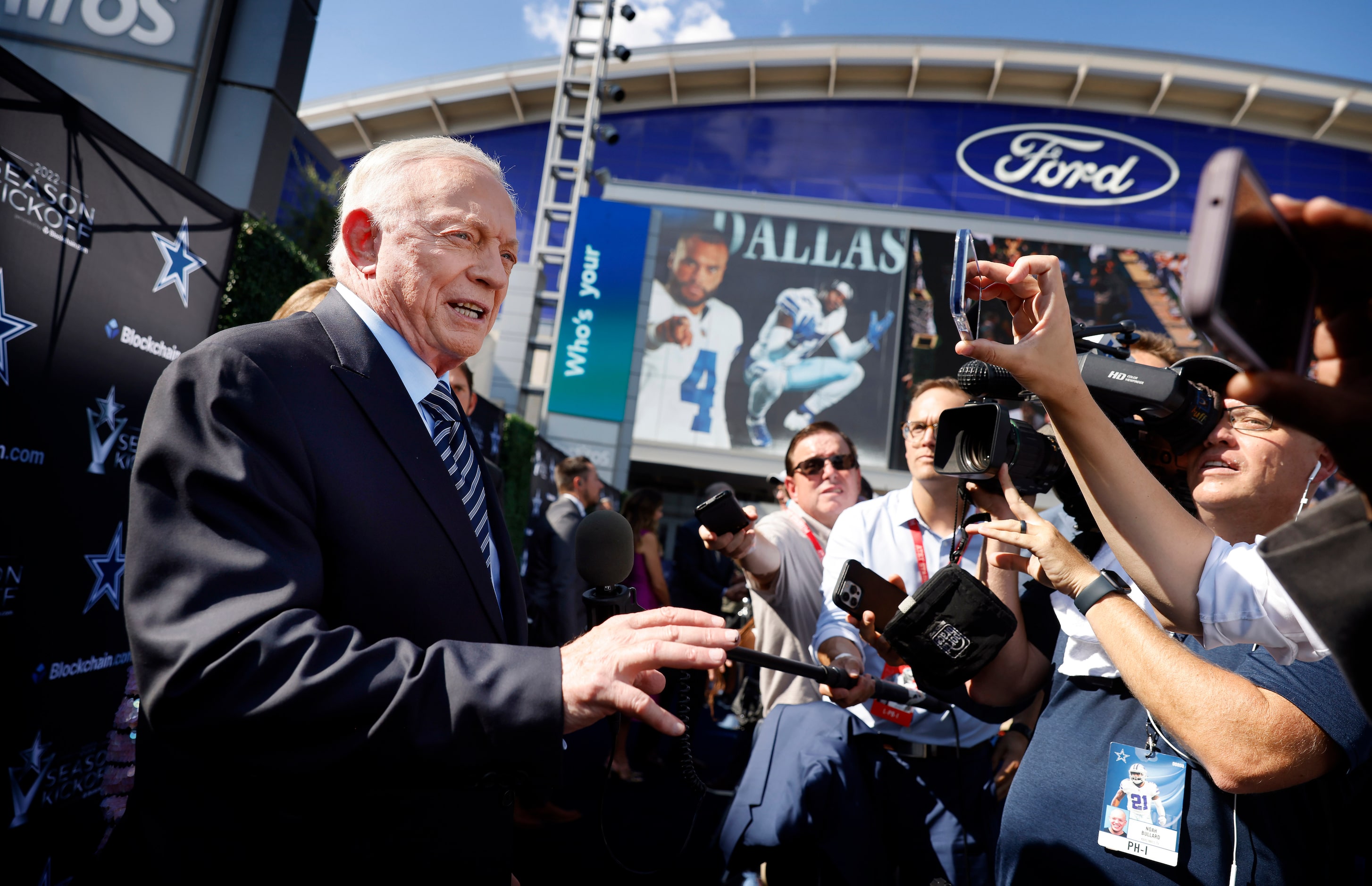 Dallas Cowboys owner Jerry Jones answers questions on the blue carpet as he arrives to the...