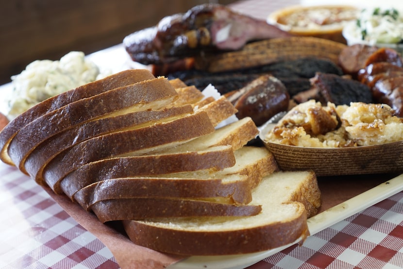 The Goldee's guys make their own brioche, which is served for free with brisket,...