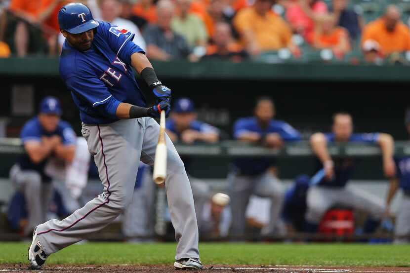 BALTIMORE, MD - JULY 9: Nelson Cruz #17 of the Texas Rangers hits against the Baltimore...