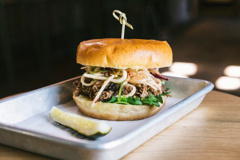 The brisket sandwich is a popular order at Loro.