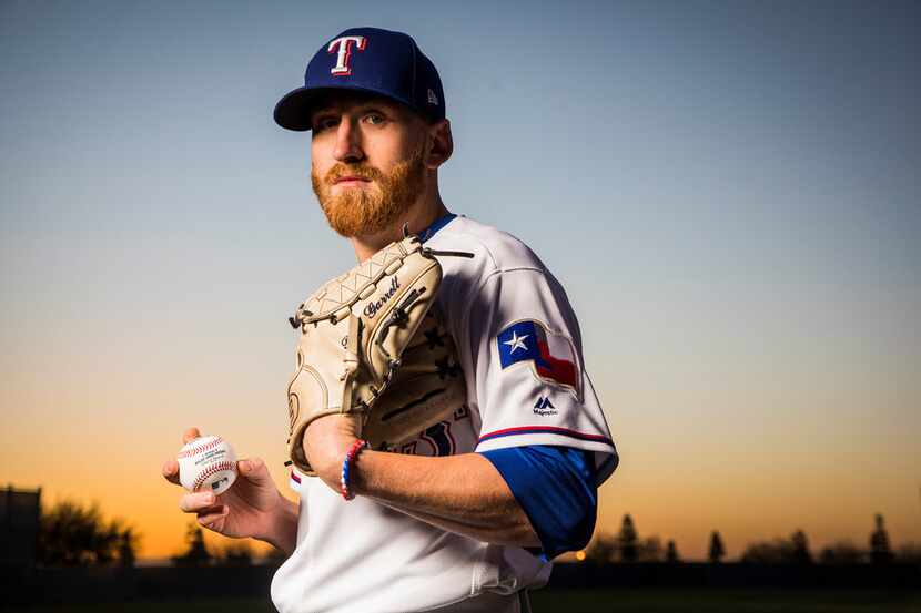 Texas Rangers pitcher Reed Garrett poses for a photo during Spring Training picture day at...