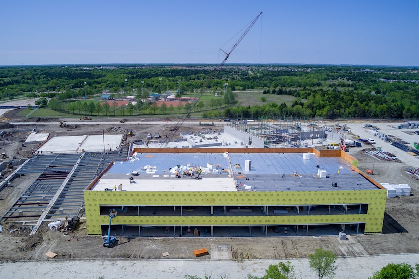 A photo shows construction progress on Mesquite ISD's Innovative Education Center, which is...