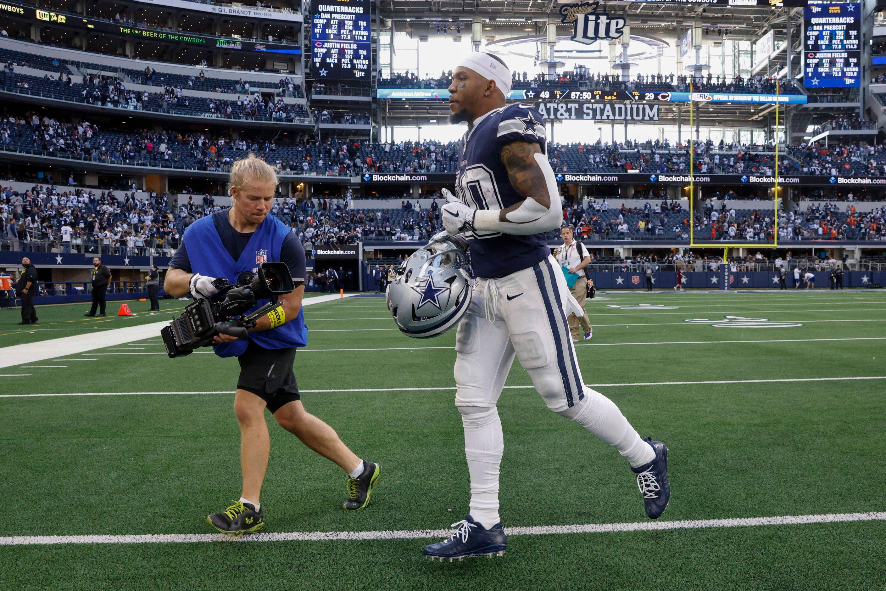 Dallas Cowboys running back Tony Pollard (20) jogs off the field after an NFL game against...