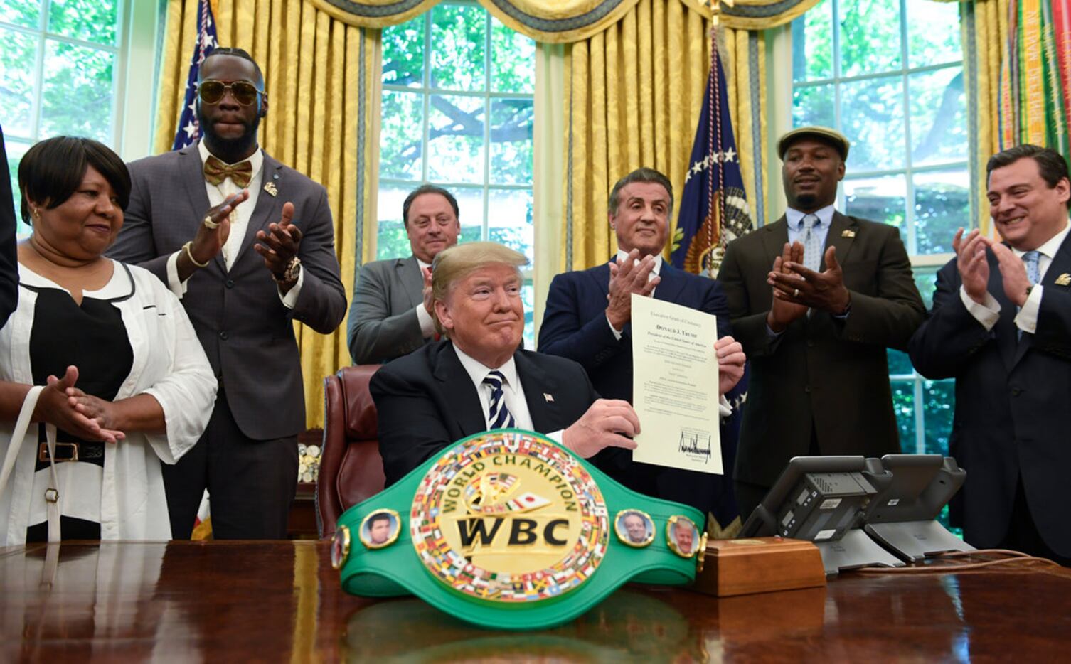 President Donald Trump center, posthumous pardons Jack Johnson, boxing's first black...
