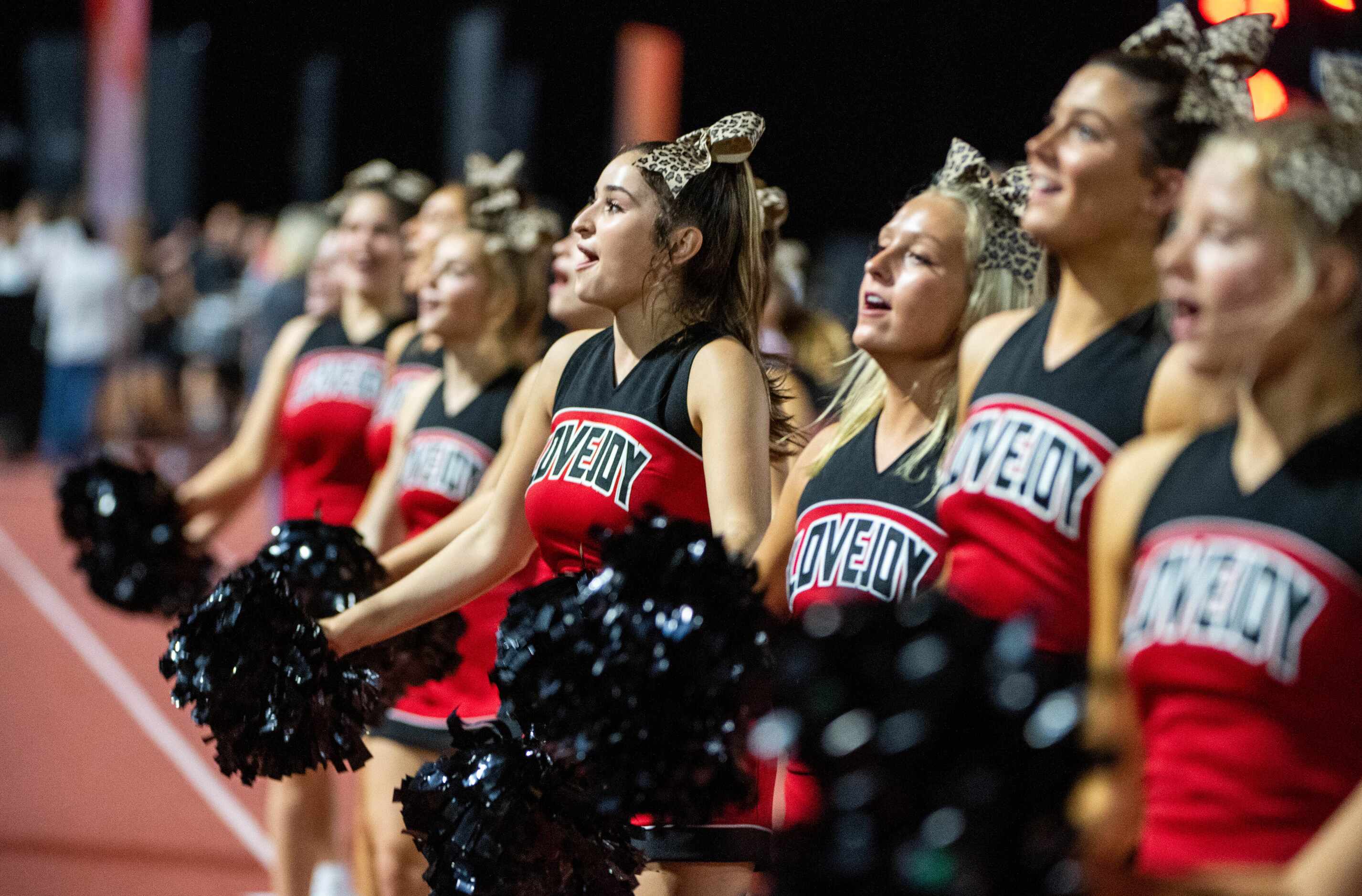 Lovejoy cheerleaders perform in the first half during a high school football game between ...