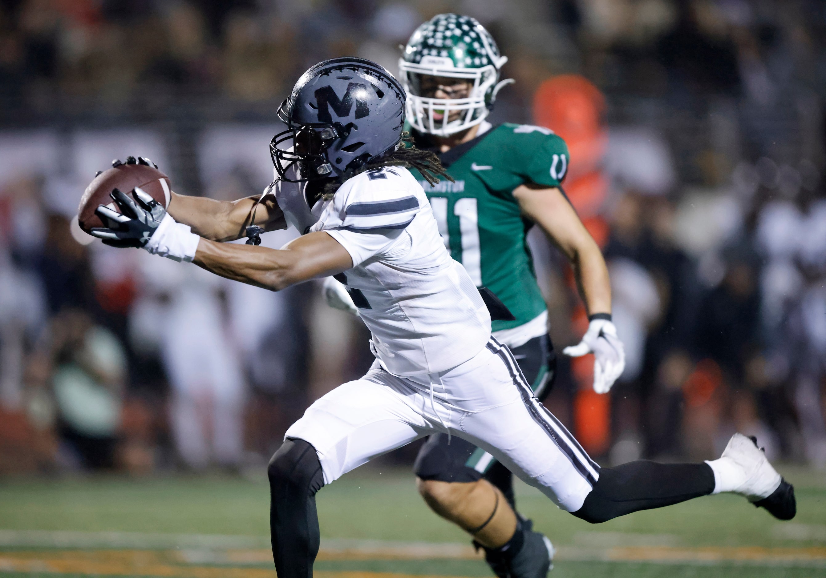 Arlington Martin defensive back Trantan Miles (2) intercepts a fourth quarter pass in the...