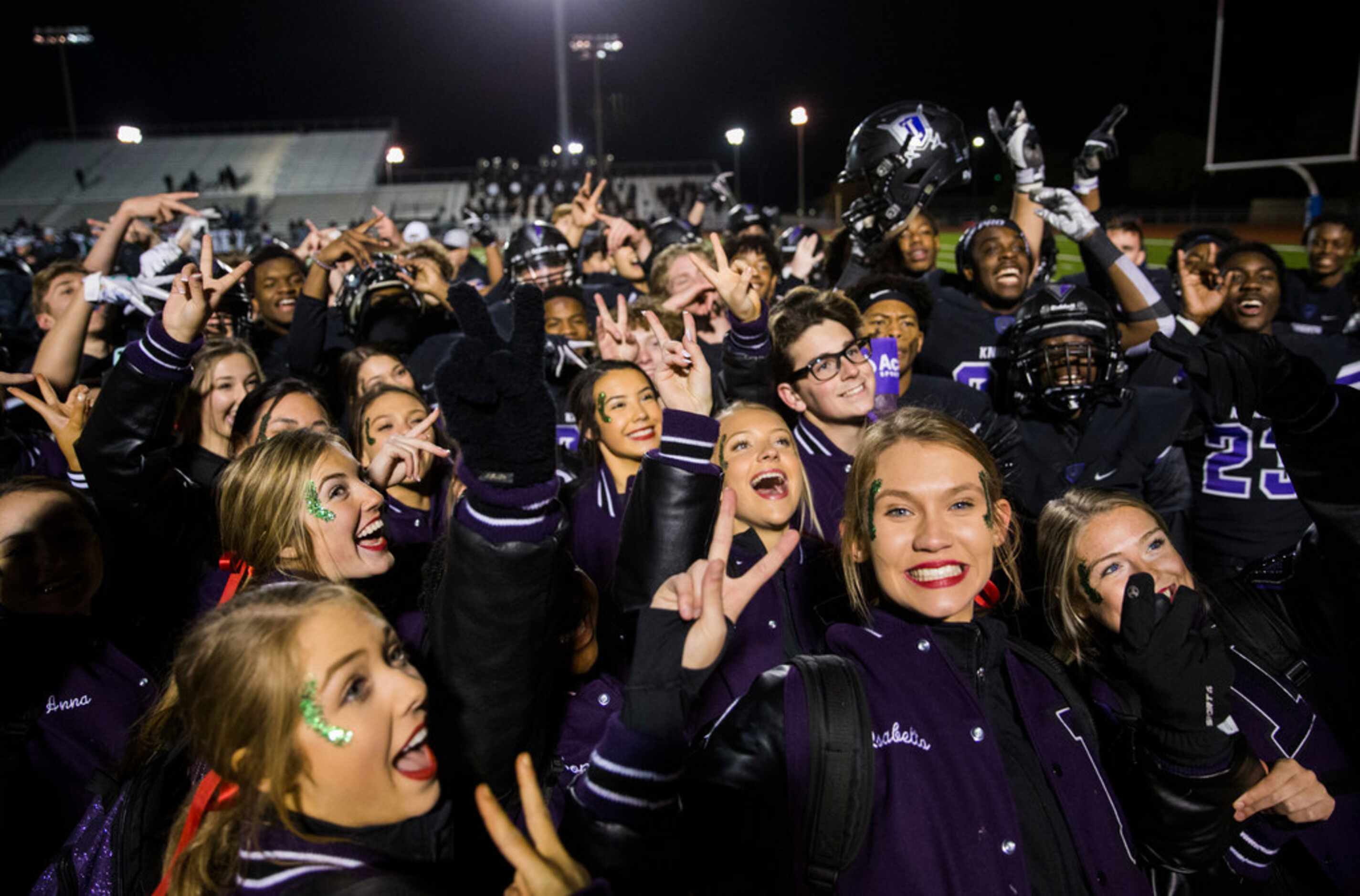 Frisco Independence football players and cheerleaders celebrate making it to the second...