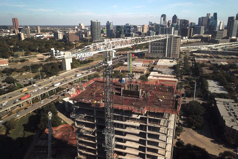 The Urby apartment tower is being built near the intersection of Stemmons Freeway and Oak...