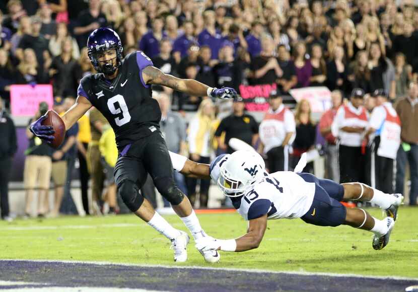 TCU Horned Frogs wide receiver Josh Doctson (9) scores a touchdown as West Virginia...