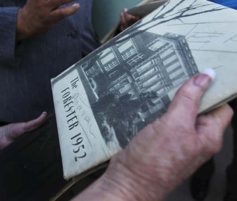 A Forest Avenue High School yearbook from 1952 was brought to a gathering of alumni Thursday...