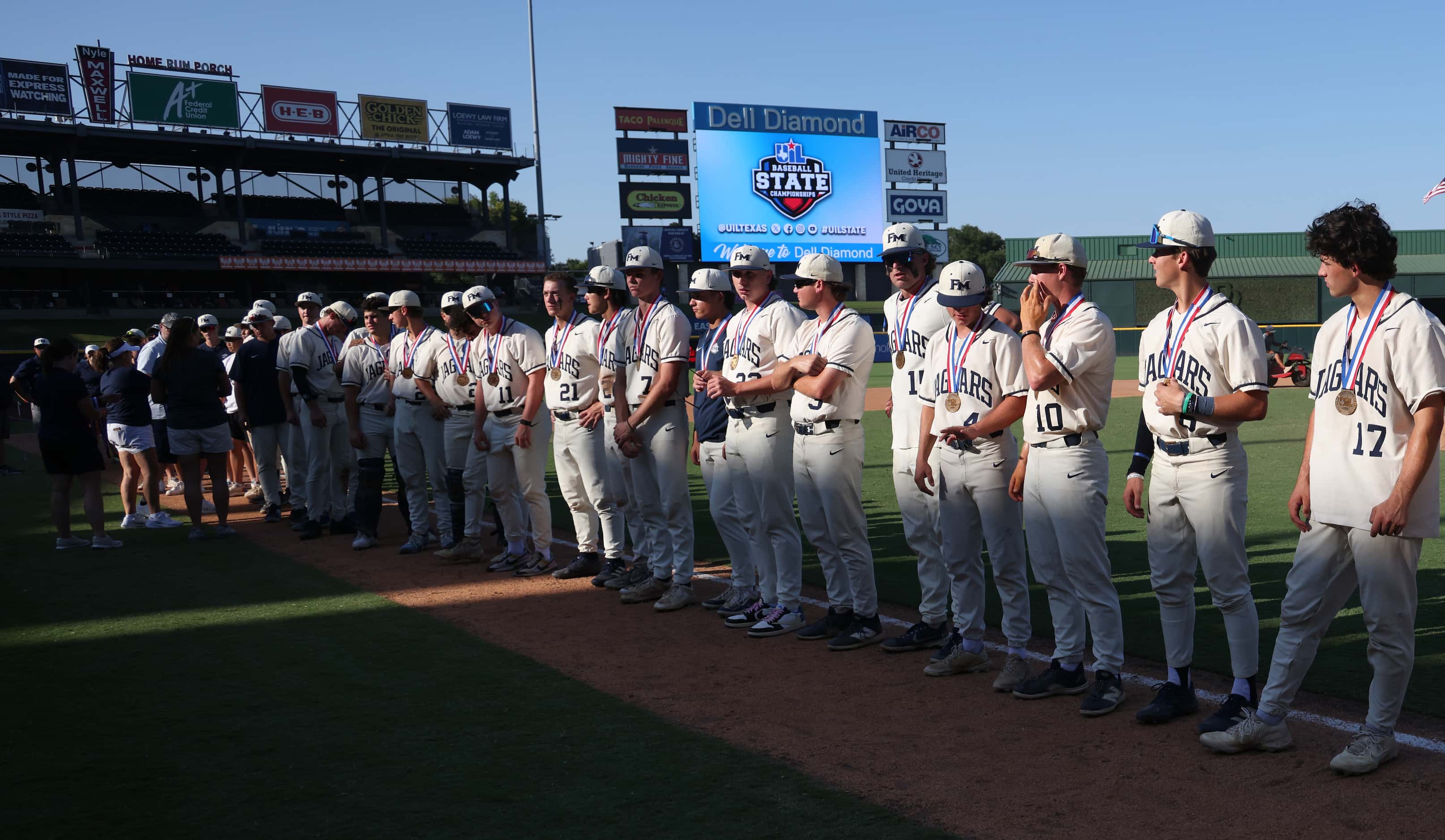 Flower Mound players receive their runner-up medals following their season-ending 2-1 loss...