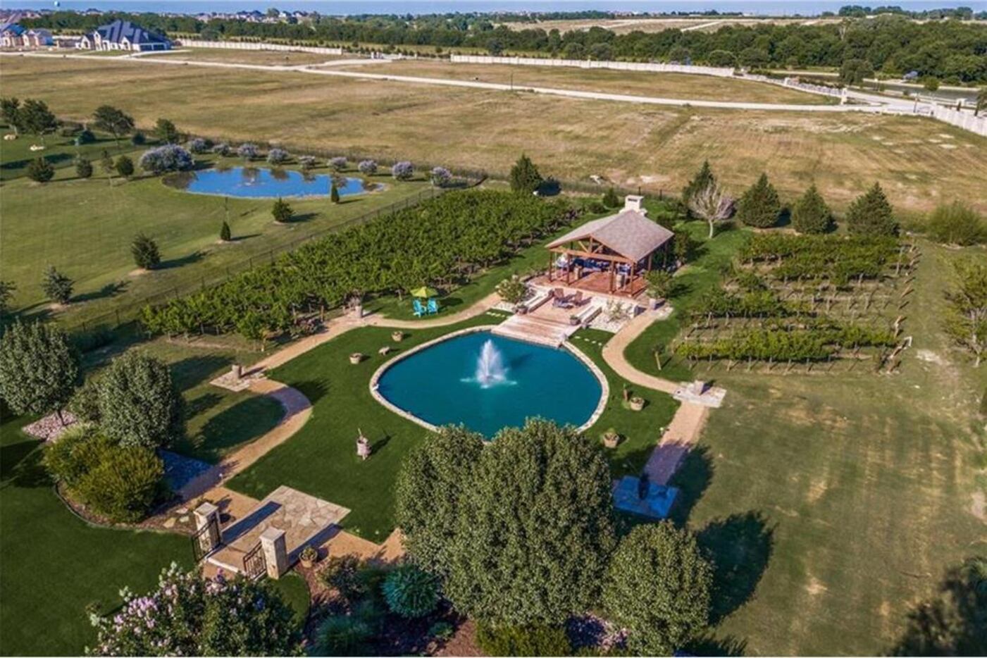 The estate east of Preston Road has a pool and vineyard.