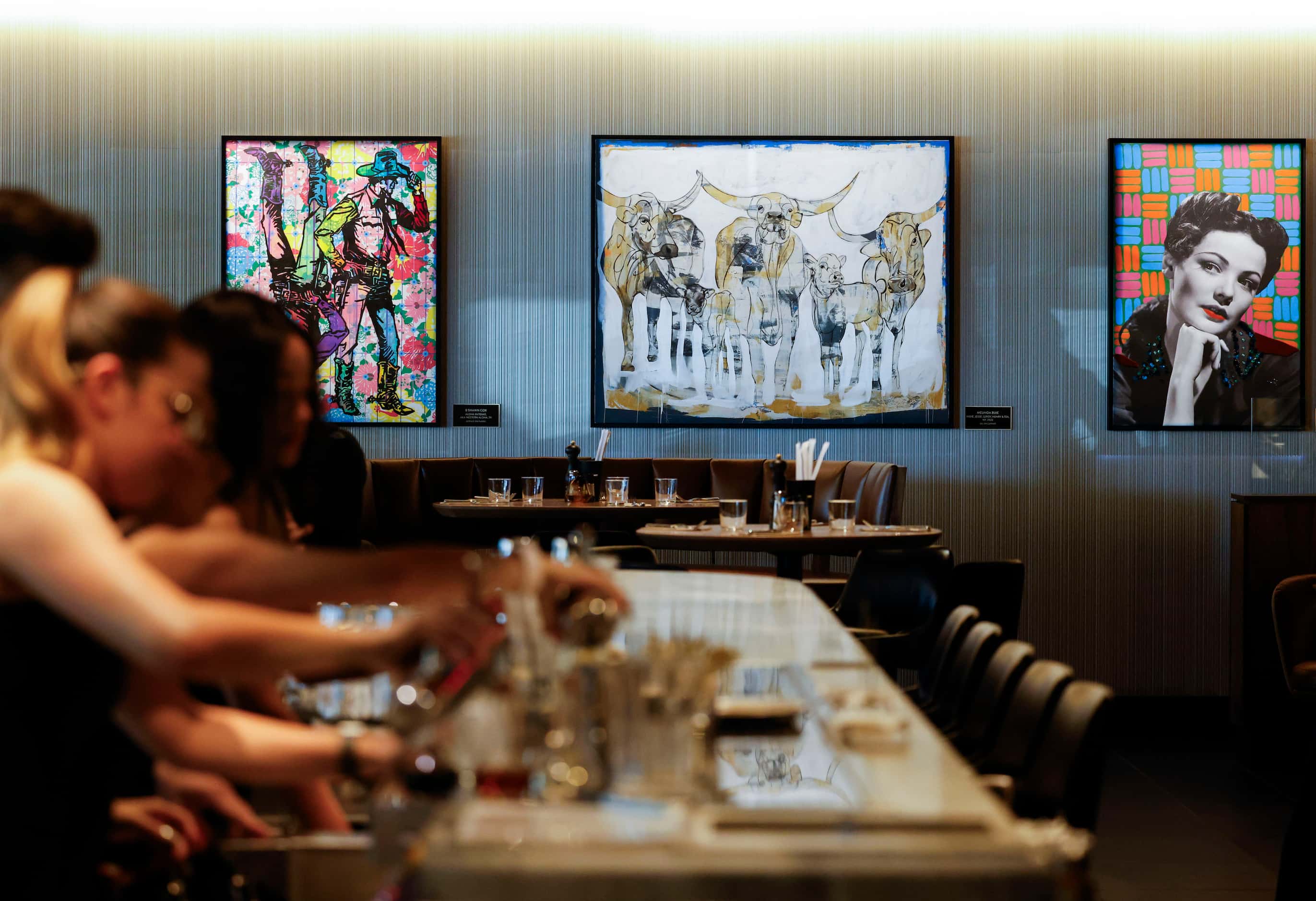 Paintings liven up the restaurant at Joey in NorthPark. Curious customers will find the name...