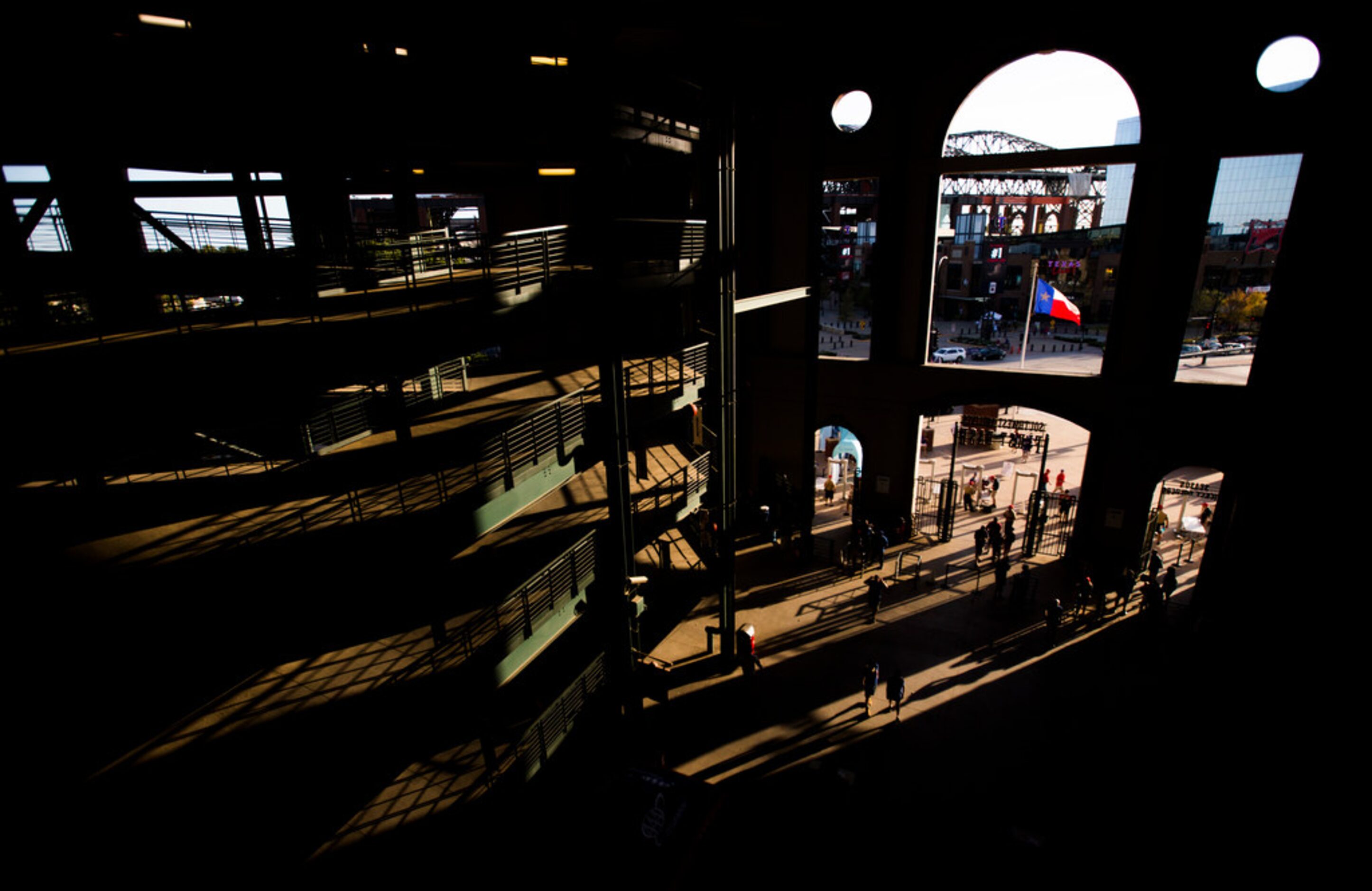 Baseball fans enter the stadium before an MLB game between the Boston Red Sox and the Texas...