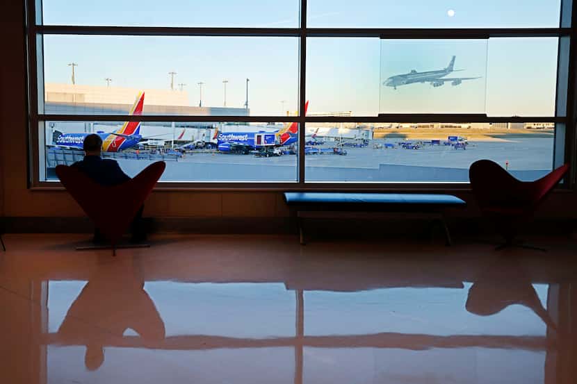 Southwest Airlines planes are parked at Dallas Love Field airport, Monday, Dec. 25, 2023, in...