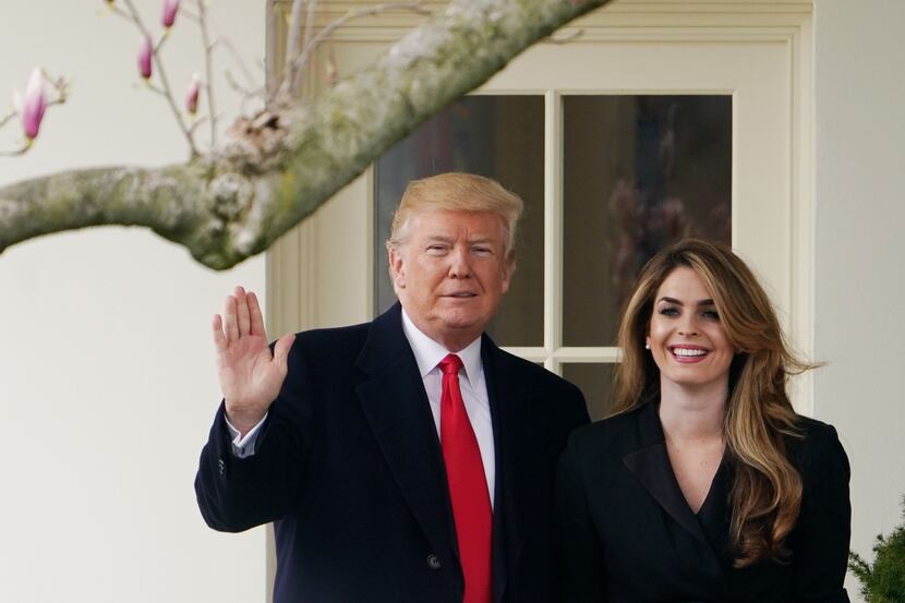 President Donald Trump poses with Hope Hicks shortly before making his way to board Marine...