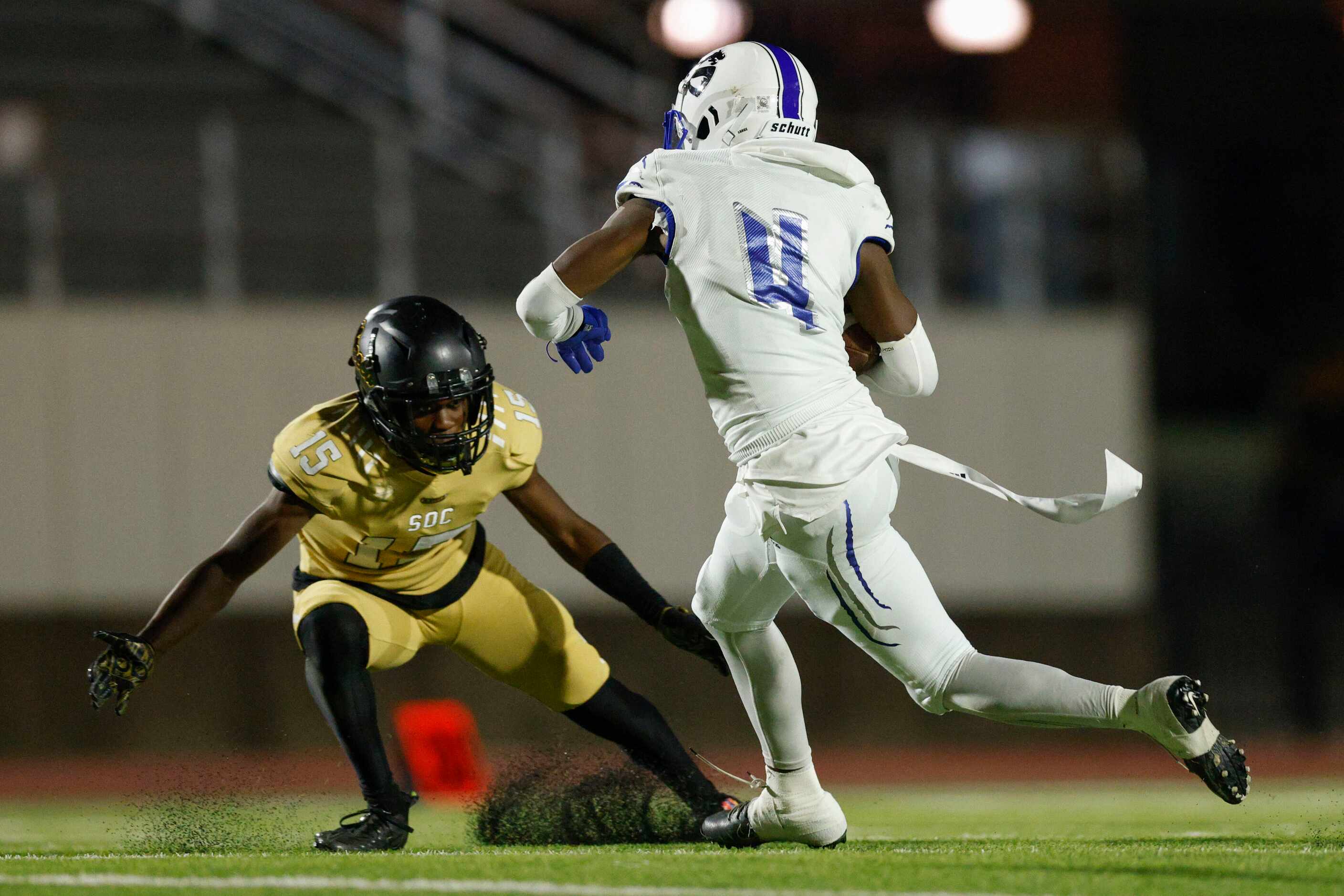 Seagoville defensive back Damarion Watson (4) dodges a tackle from South Oak Cliff wide...