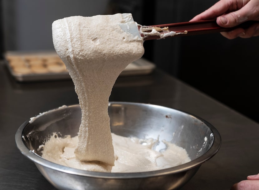 The lava flow of batter after the mixing of Italian meringue and almond flour