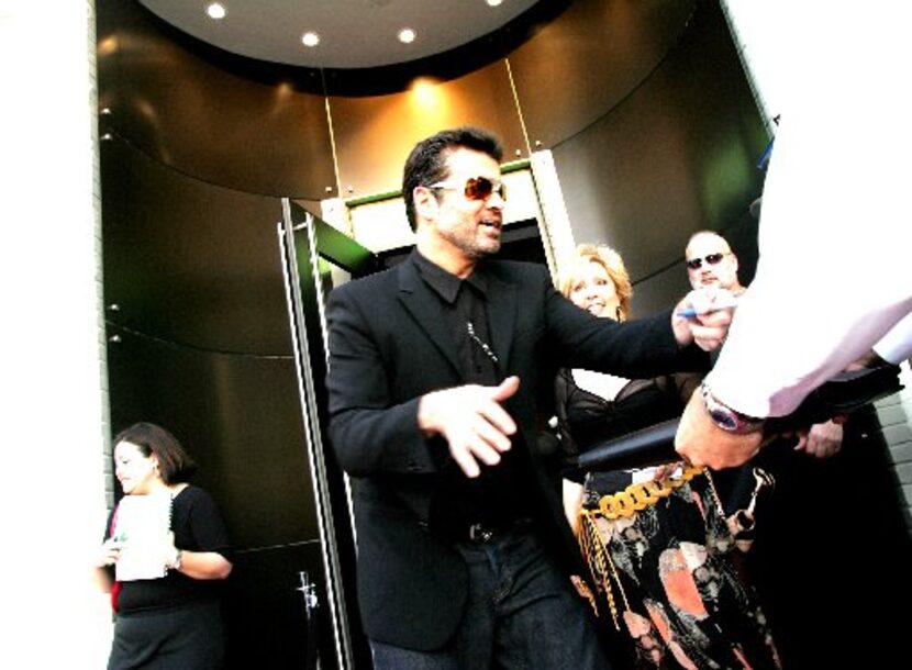 George Michael in 2005 outside of Goss Gallery on Cedar Springs in Dallas (Courtney...