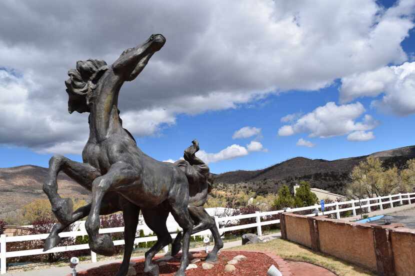 One of eight equine statues outside the Hubbard Museum of the American West by sculptor...