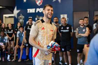 FC Dallas goalkeeper Maarten Paes reacts after being informed that he has been selected for...