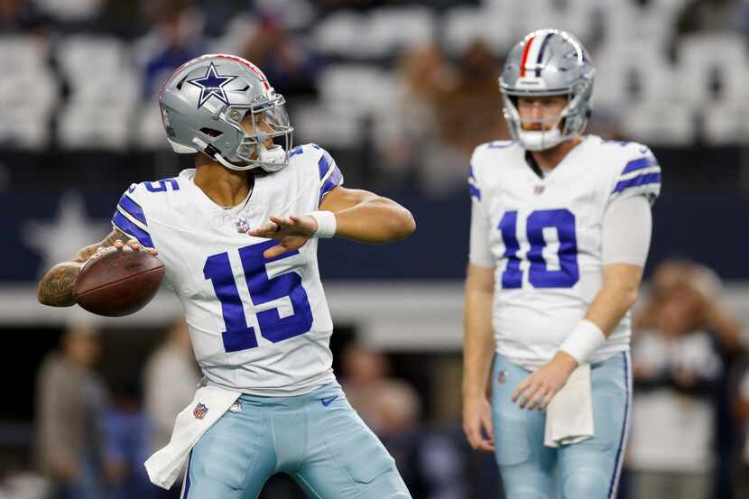 Dallas Cowboys quarterback Trey Lance (15) throws a pass before the first half of an NFL...