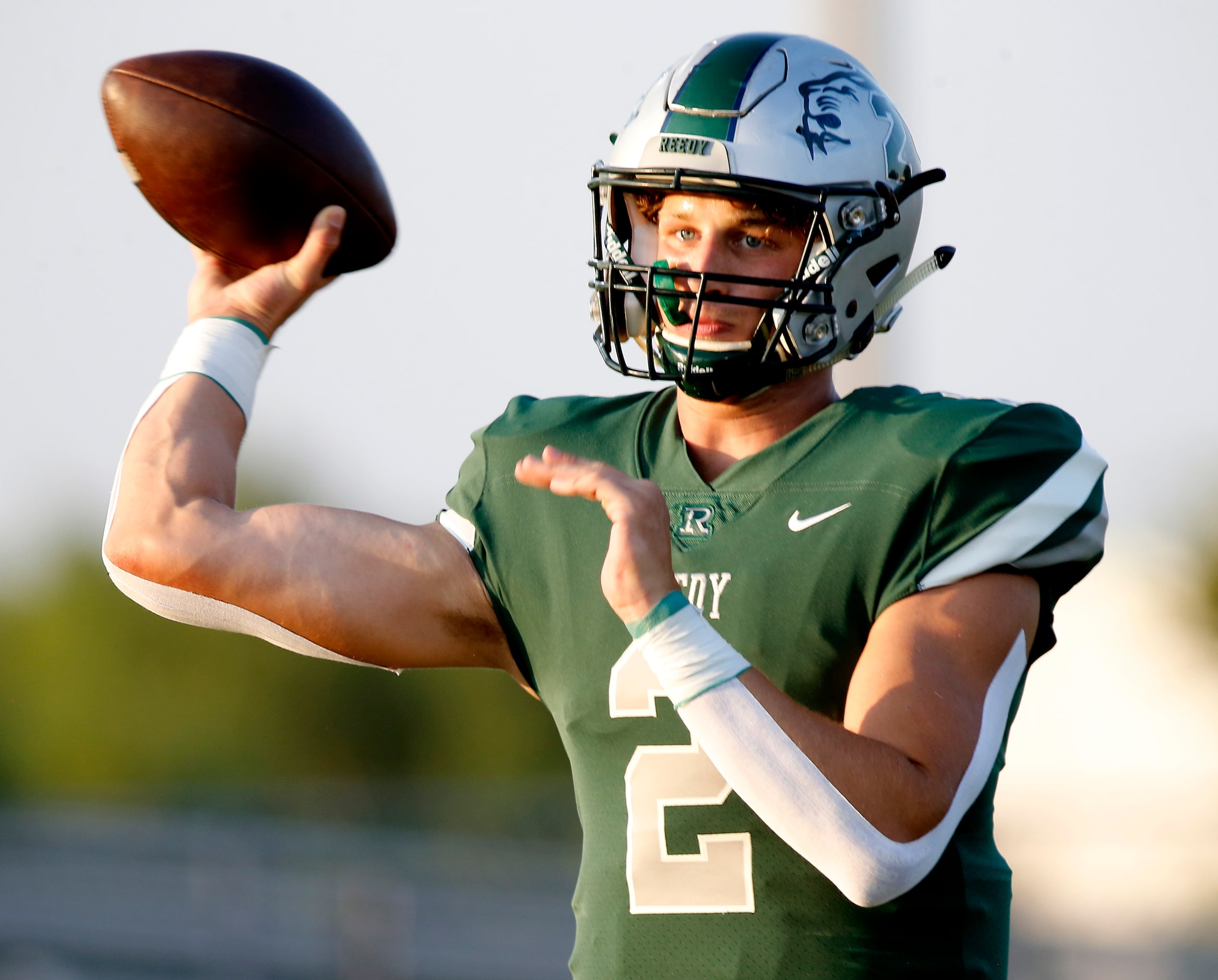 Reedy High School quarterback A.J. Padgett (2) throws a pass during the first half as Reedy...