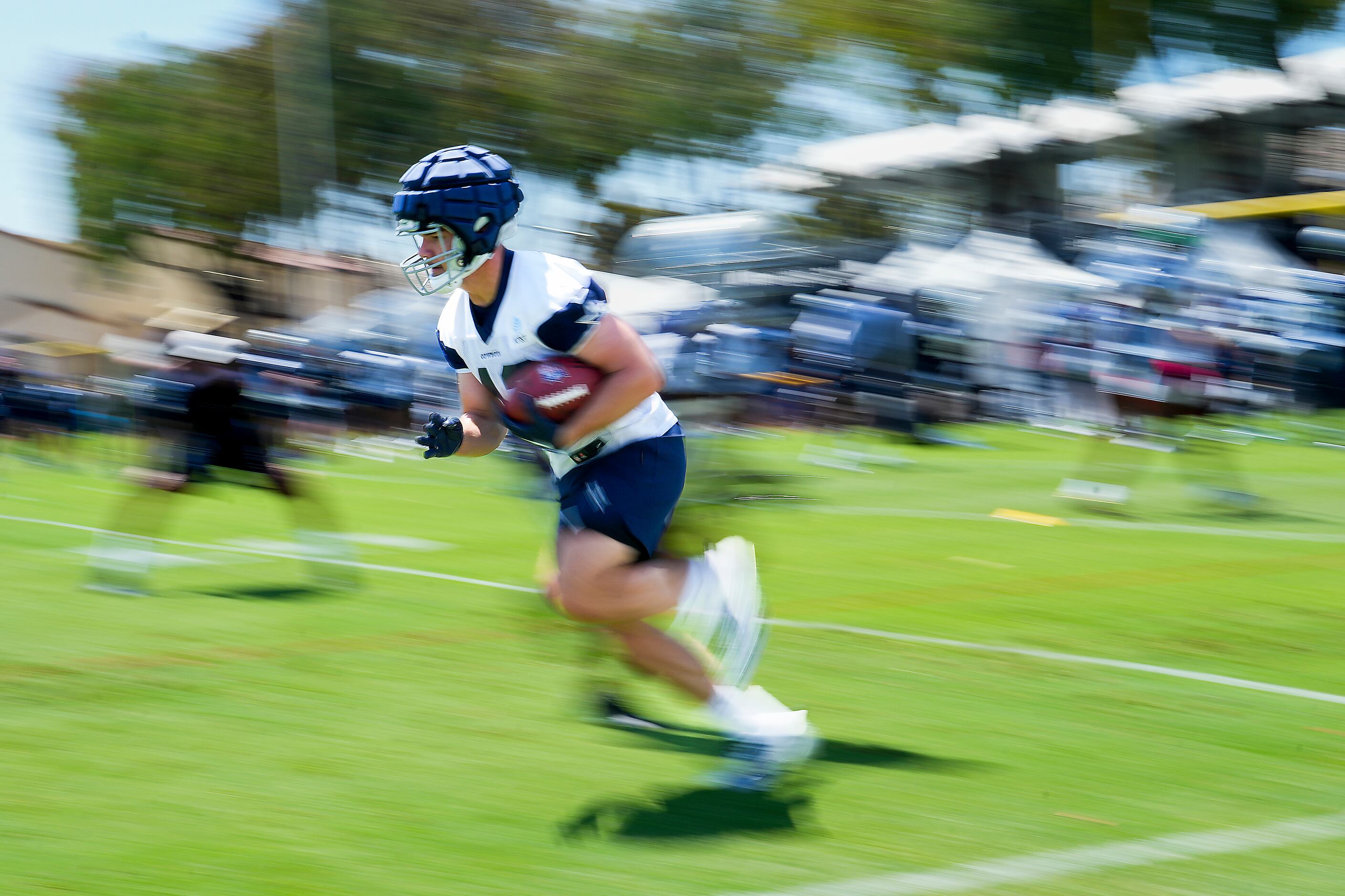 Dallas Cowboys running back Hunter Luepke (43) catches a pass