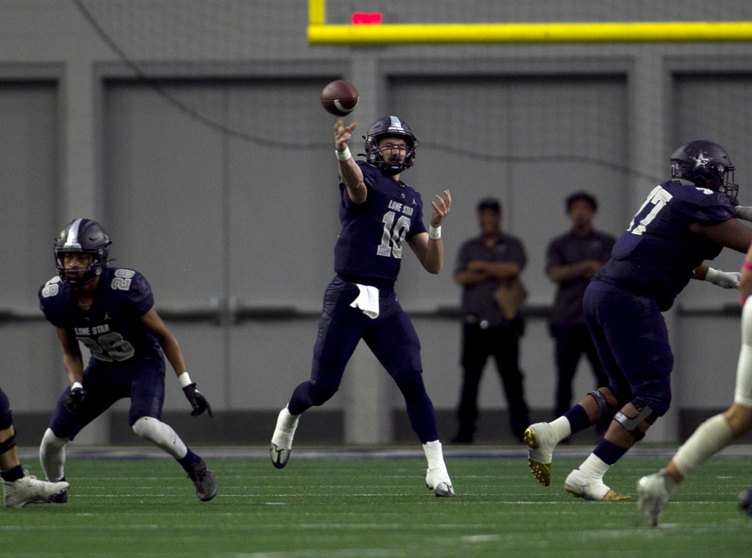 Frisco Lone Star quarterback Collin Blackstock (10) launches a pass downfield during first...