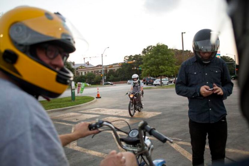 
Members of Pine Box Pedal Club gather outside a gas station in Dallas, Texas, before...