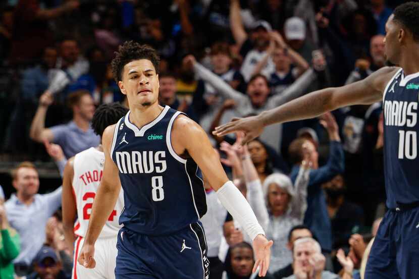 Dallas Mavericks guard Josh Green (8) celebrates his dunk with Dallas Mavericks forward...