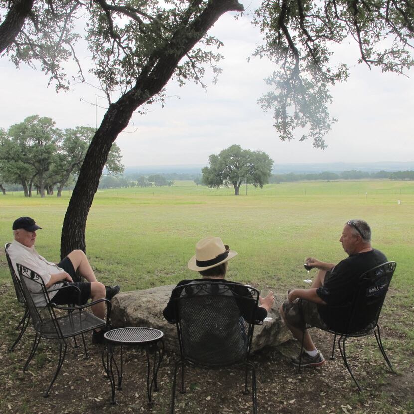 At Pedernales Cellars, guests enjoy wine with a view of the Pedernales River Valley in...
