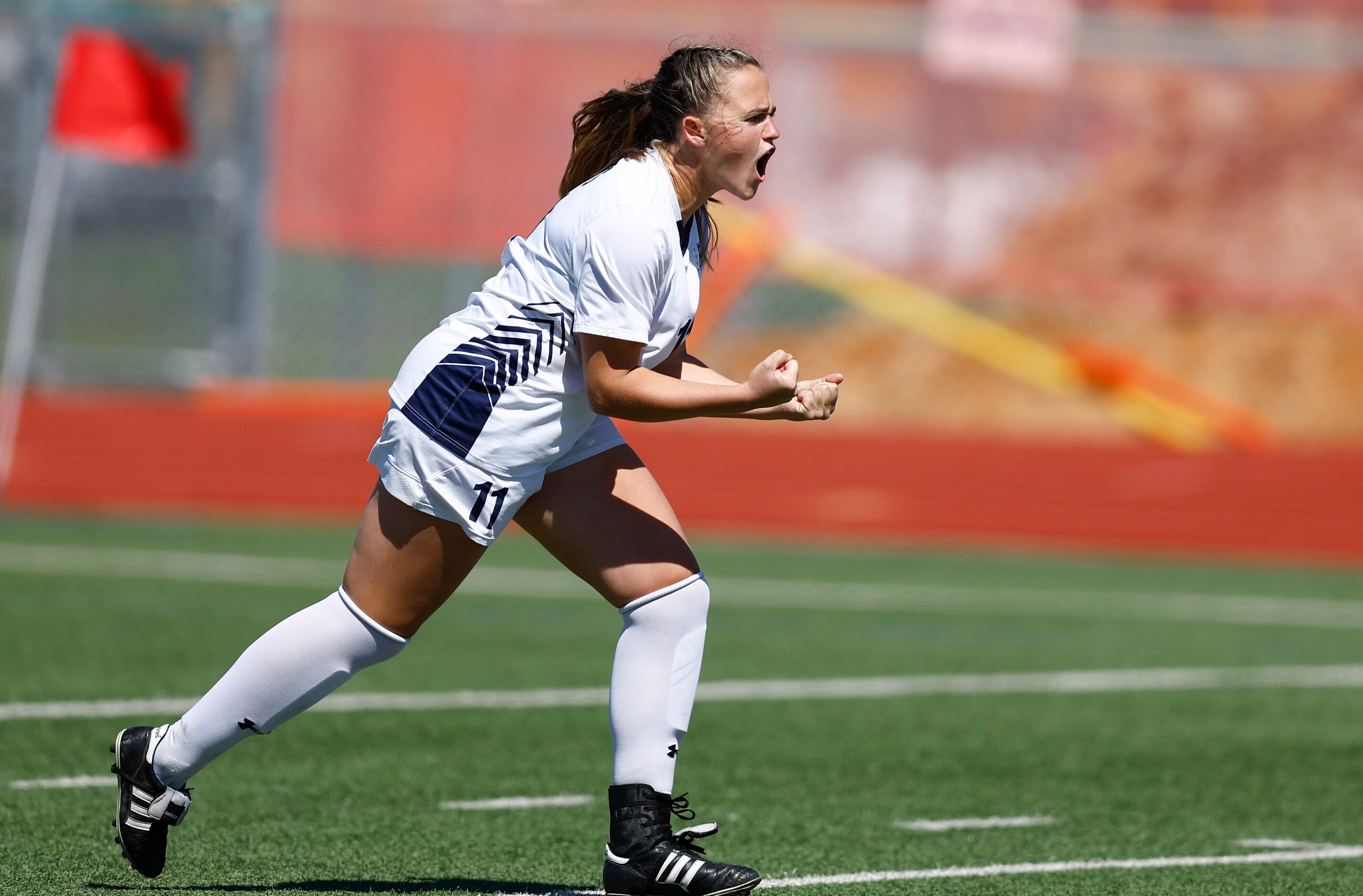 Highland Park’s Ella Weathersby celebrates scoring a shootout goal during the Class 5A...