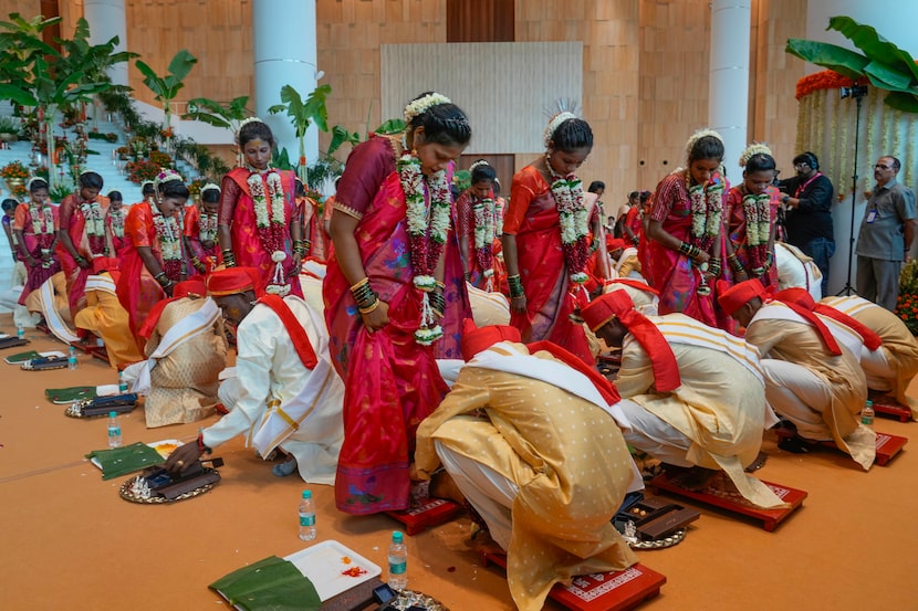 Underprivileged couples take part in a mass wedding July 2, 2024, organized by India's...