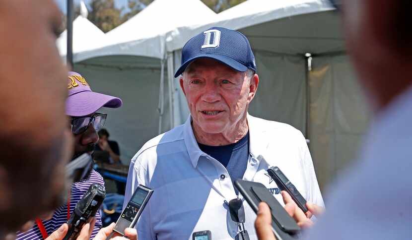 Cowboys owner Jerry Jones answers questions for reporters during a press conferences at the...