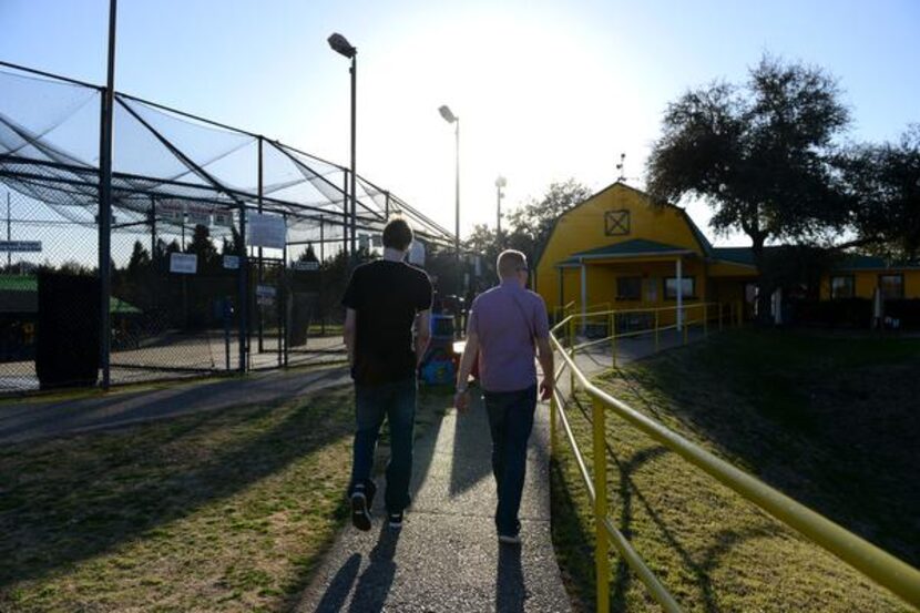 
Masek and Jordan walk back to the parking lot after riding go-karts at Ellen’s Amusement...