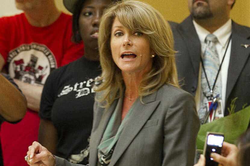State Sen. Wendy Davis, D-Fort Worth, is fighting to keep her district after the...