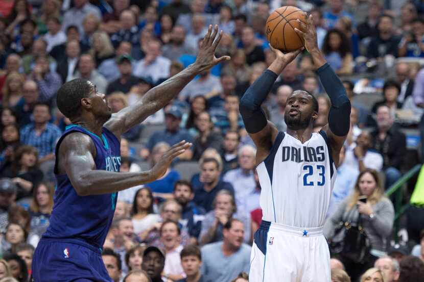 Nov 5, 2015; Dallas, TX, USA; Dallas Mavericks guard Wesley Matthews (23) shoots over...