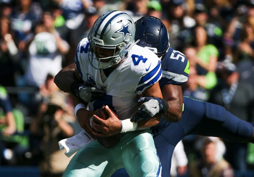 Seattle Seahawks linebacker Barkevious Mingo (51) sacks Dallas Cowboys quarterback Dak...