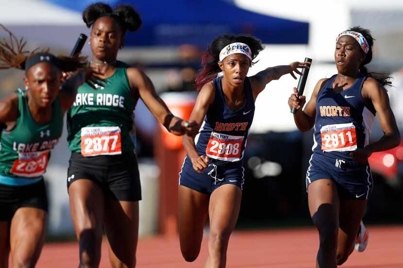 Mansfield Lake Ridge's Ariel Ford (2874) and Jasmine Moore with McKinney North's Elon'a...