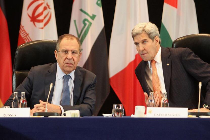 Russian Foreign Minister  Sergey Lavrov and U.S. Secretary of State John Kerry work on an...