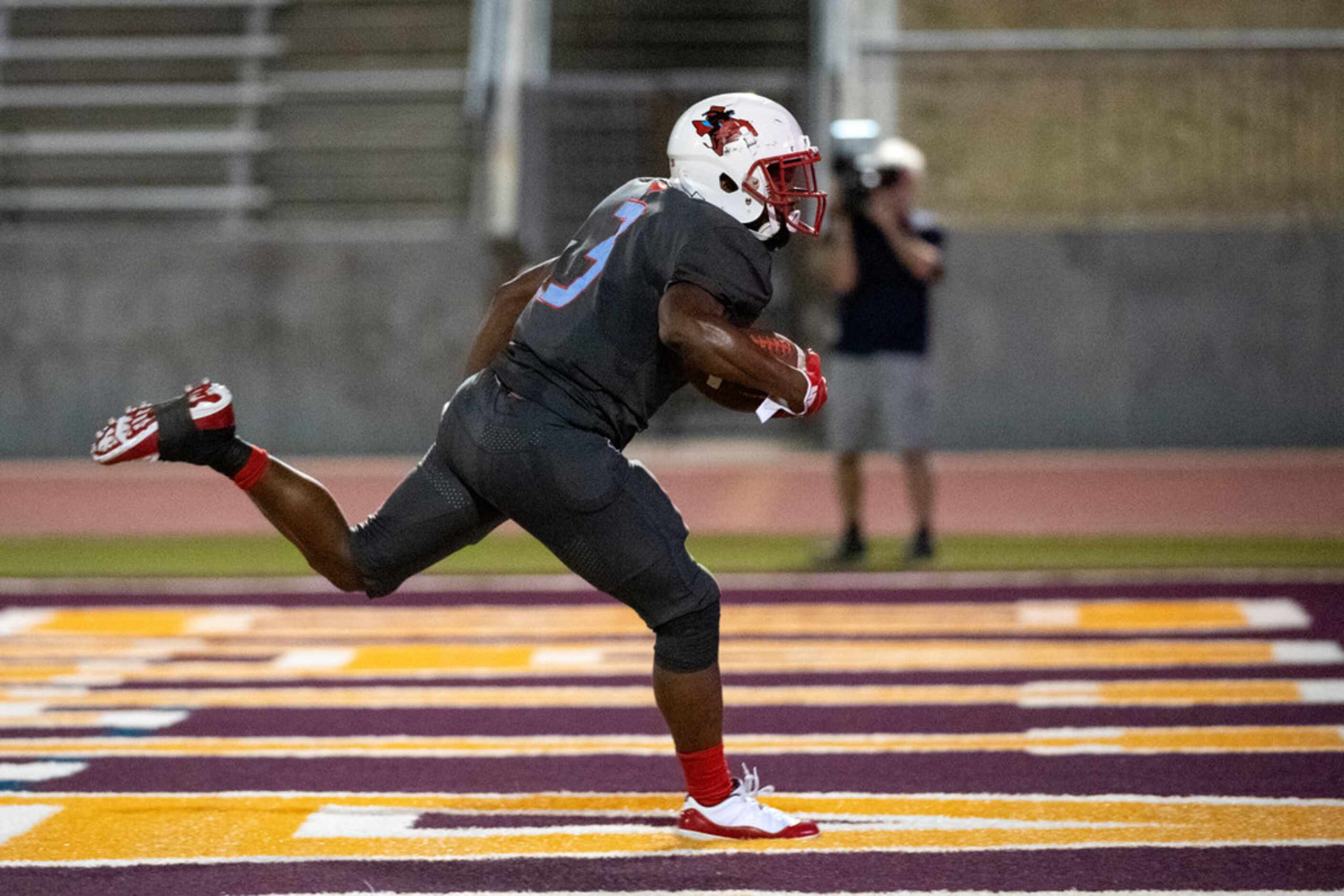 Skyline junior running back Jalynn Lester (3) runs into the end zone on a touchdown run...